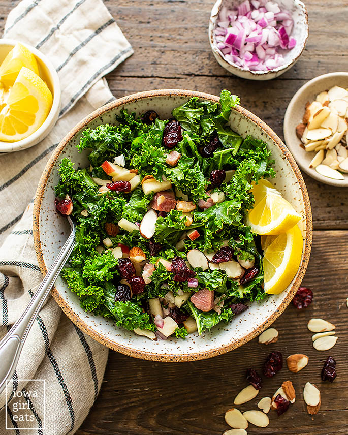 easy kale salad in a bowl with a fork