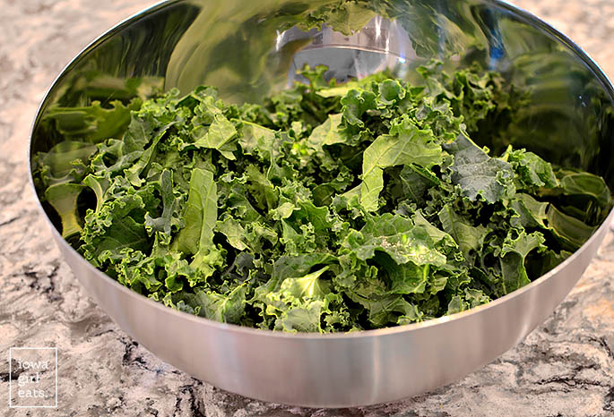 fresh kale in a mixing bowl