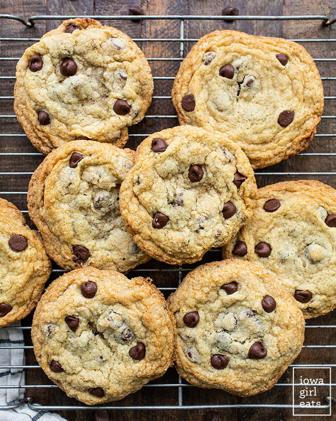 close up photo of gluten free chocolate chip cookies on a cooling rack