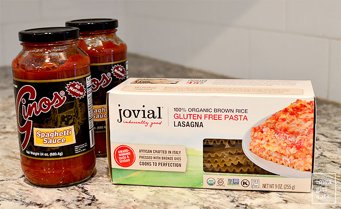 gluten free lasagna noodles and marinara sauce on the counter