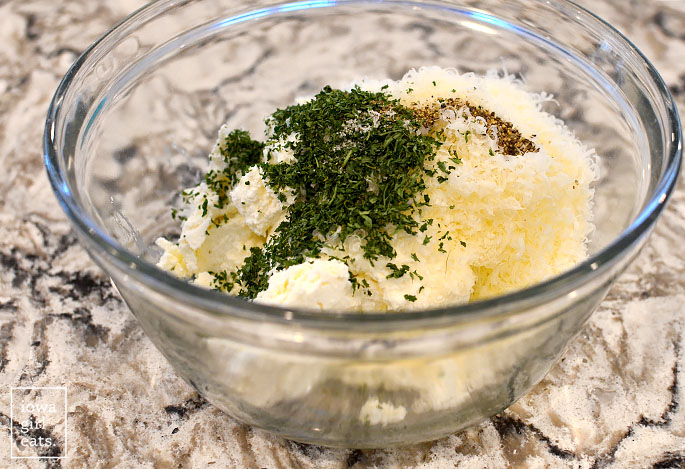 bowl with ricotta cheese and parmesan cheese