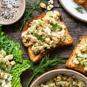 Close up photo of chicken chickpea salad on a piece of gluten-free toast