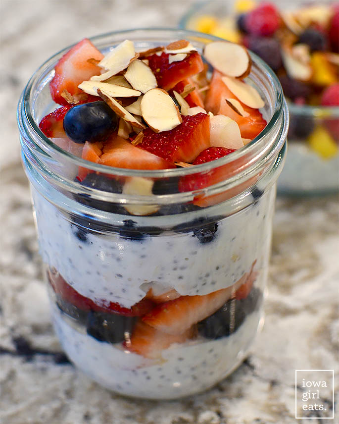 overnight oats layered with berries in a jar