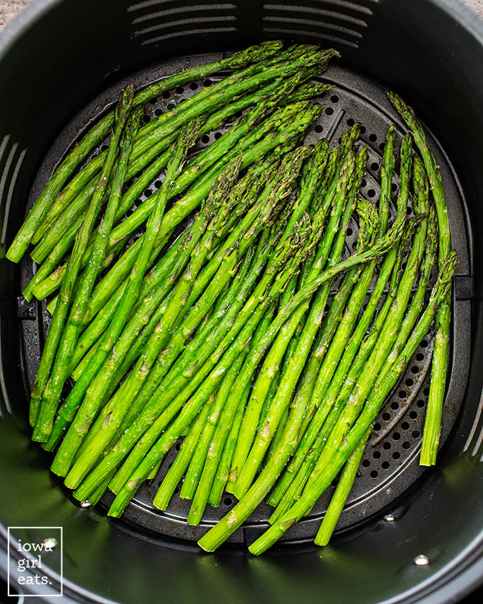Asparagus in an air fryer basket
