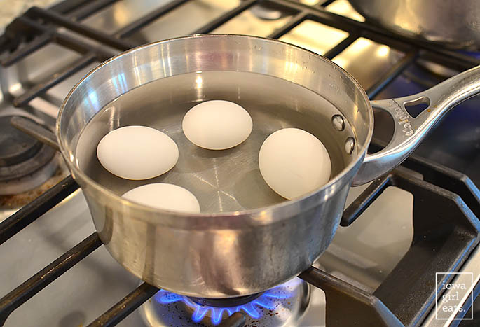 eggs simmering in a pot