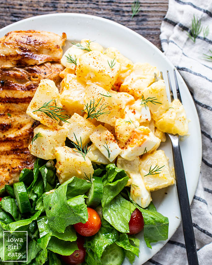 gluten free potato salad on a plate with chicken