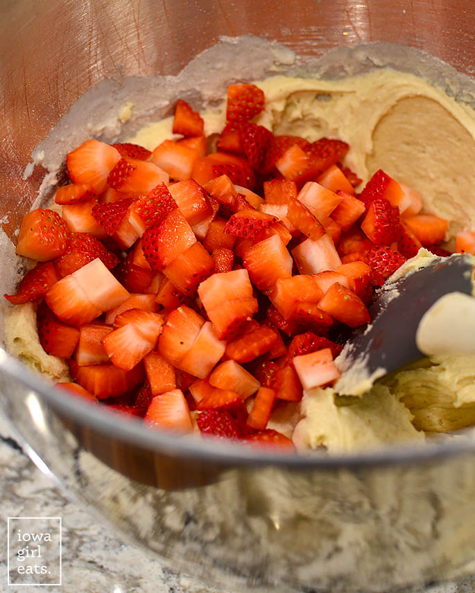 fresh strawberries added to muffin batter