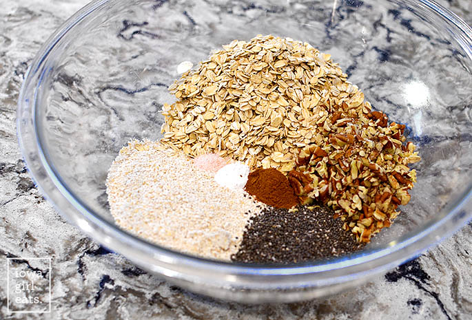 dry ingredients for baked oatmeal in a mixing bowl