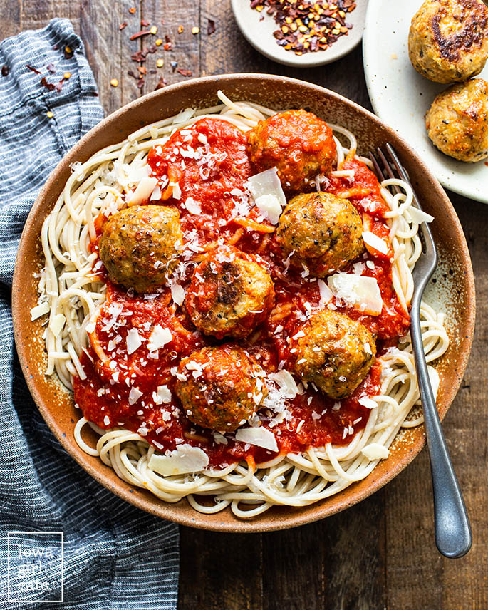 chicken meatballs on top of spahgetti