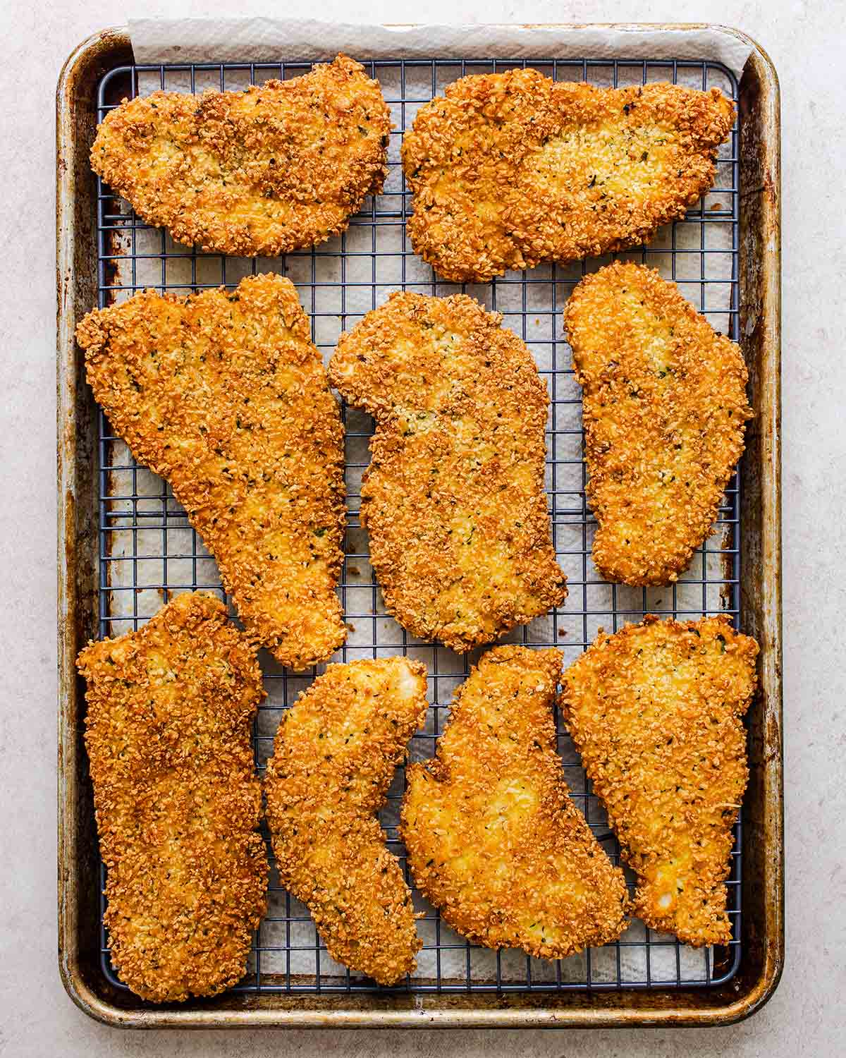 gluten free chicken cutlet on a cooling rack