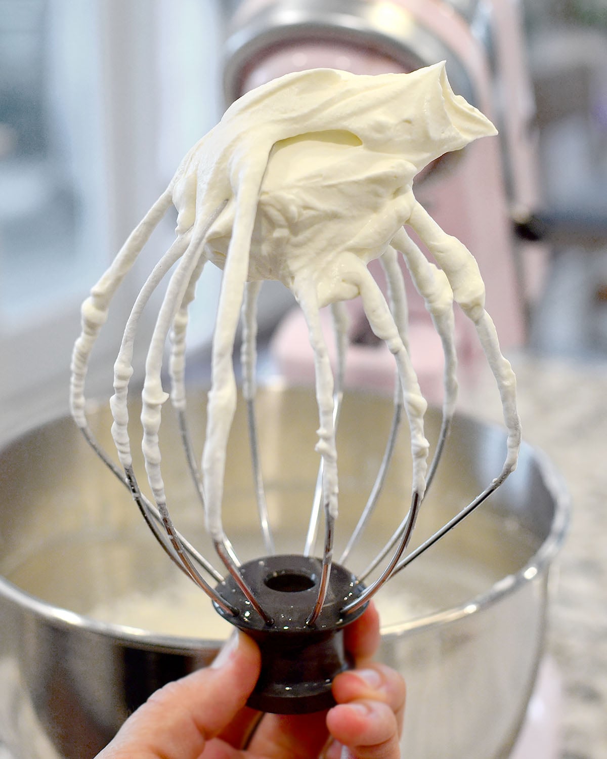 whisk with homemade whipped cream