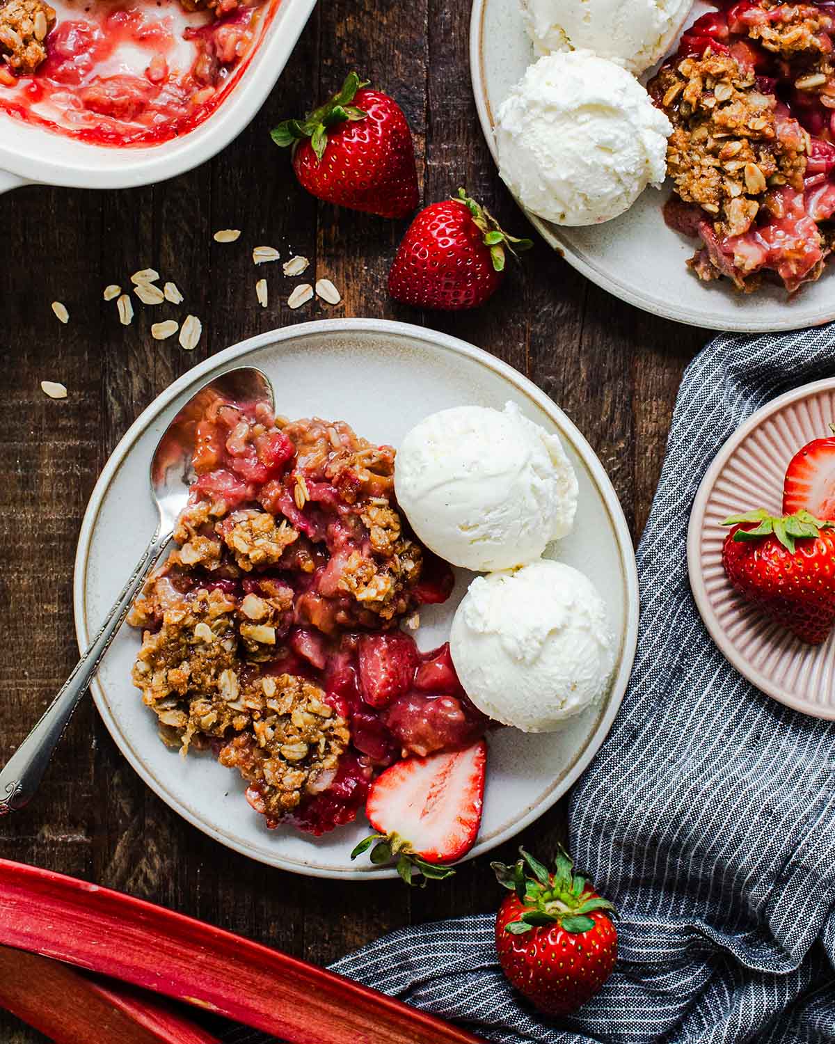 bowl of strawberry rhubarb crisp with ice cream