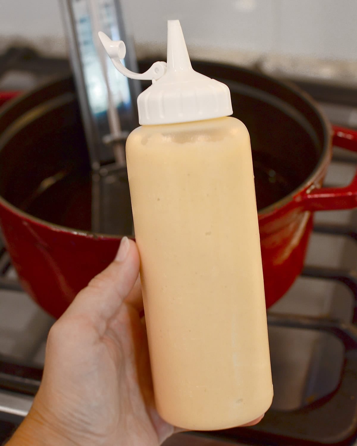 funnel cake batter in a squeeze bottle