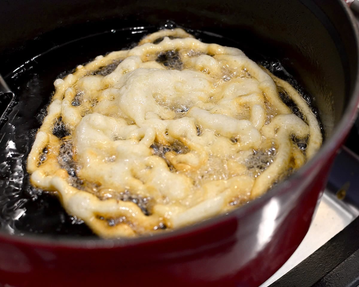 gluten free funnel cake frying in oil