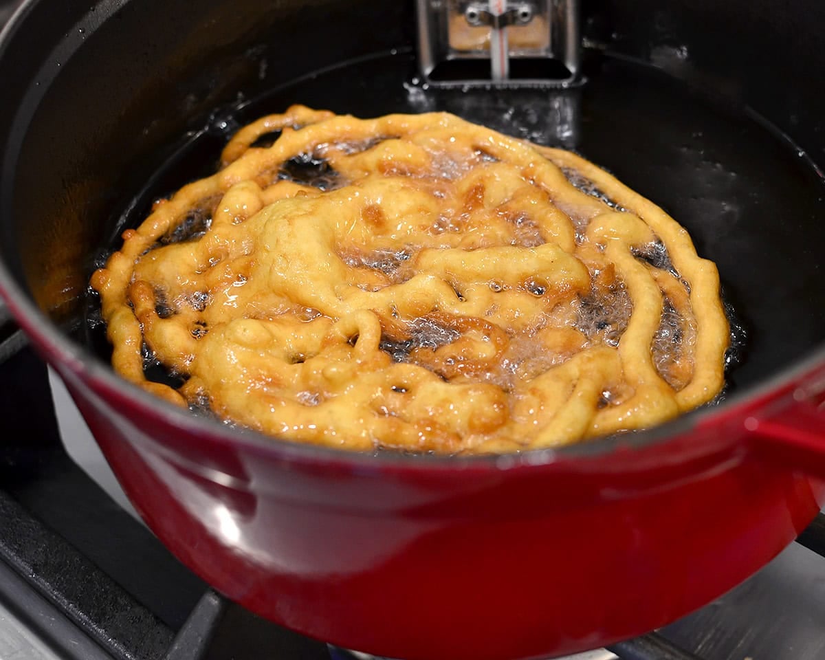 gluten free funnel cake frying in oil
