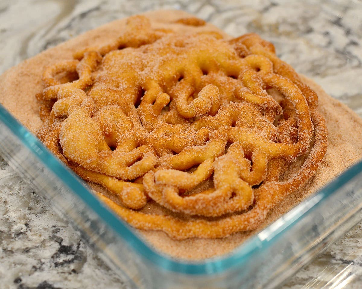 gluten free funnel cake in cinnamon sugar