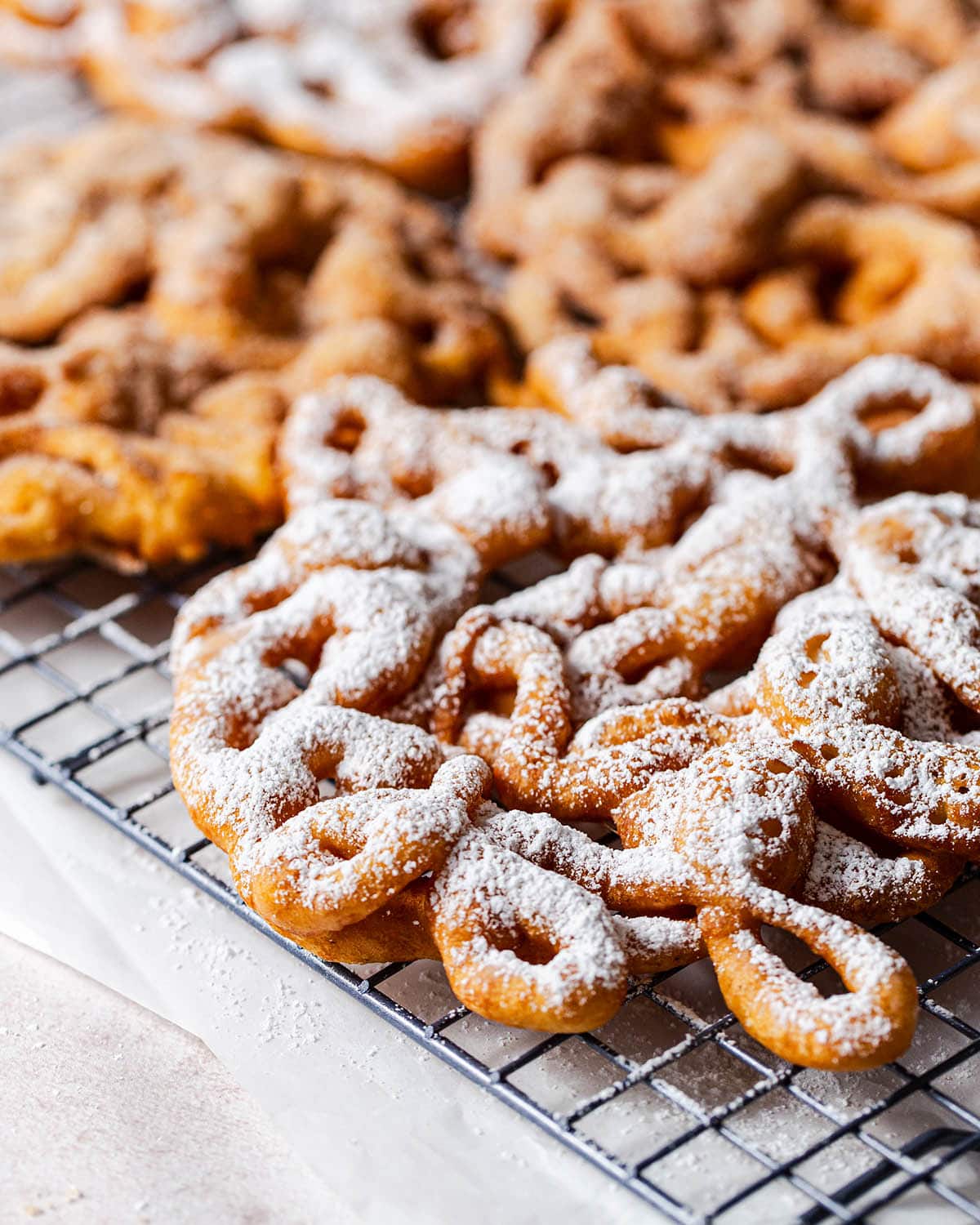 powdered sugar dusted gluten free funnel cake