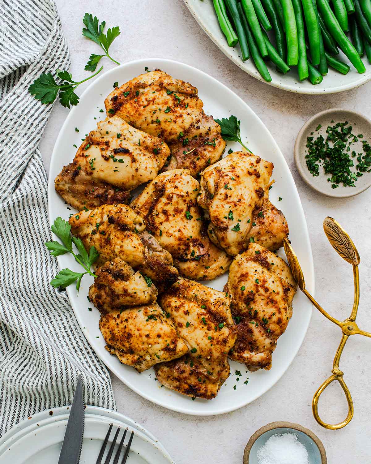 baked boneless chicken thighs on a platter