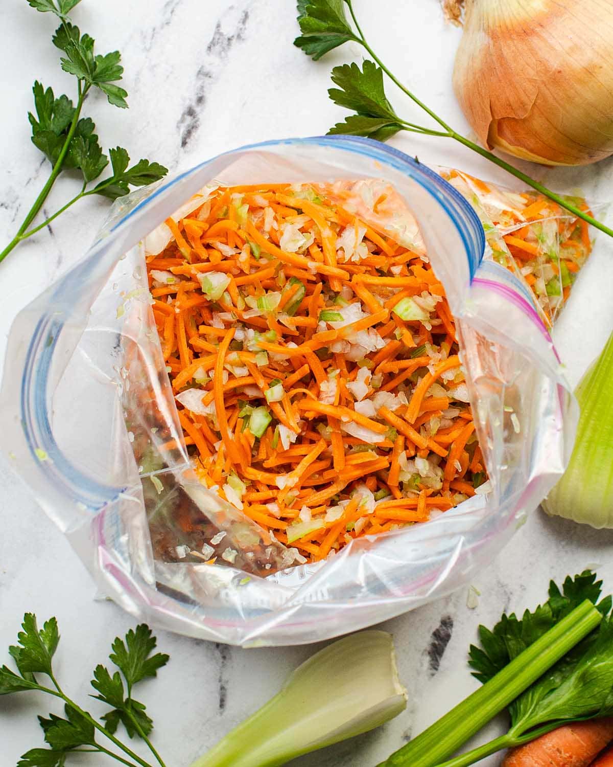 open bag of freezer mirepoix on a counter