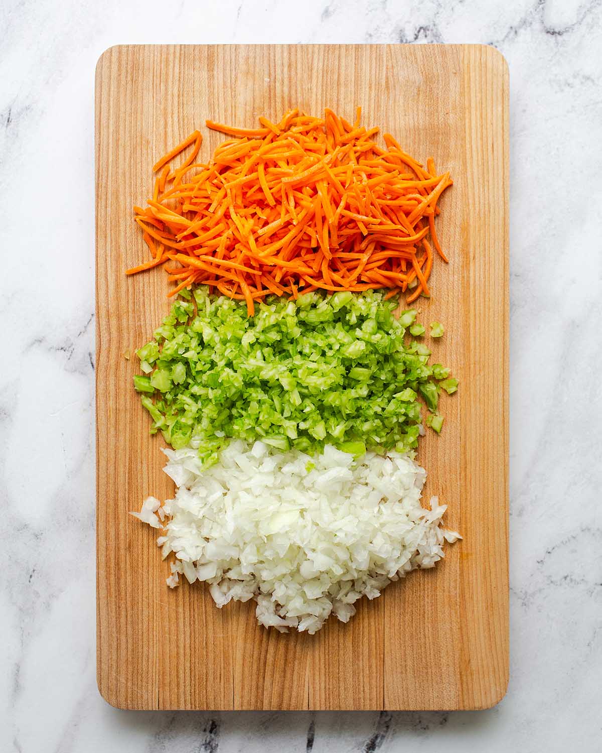 mirepoix ingredients on a cutting board