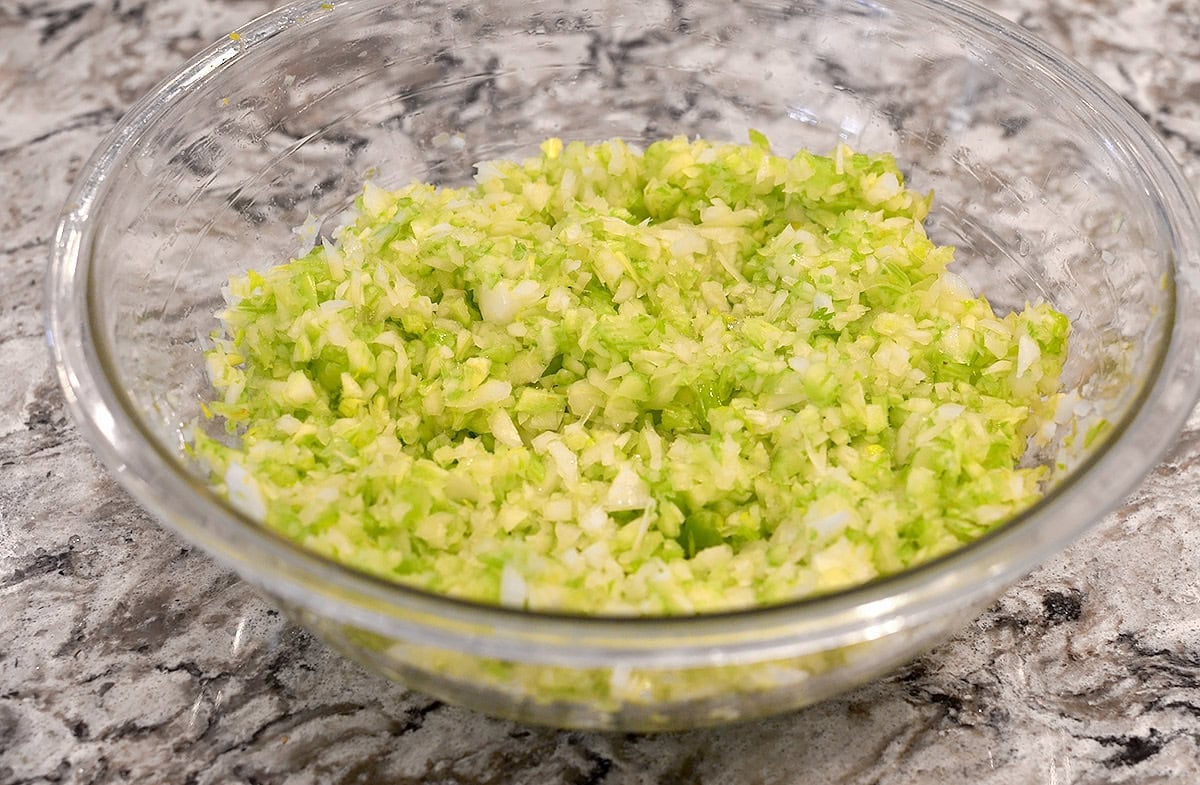 chopped celery and onion in a bowl